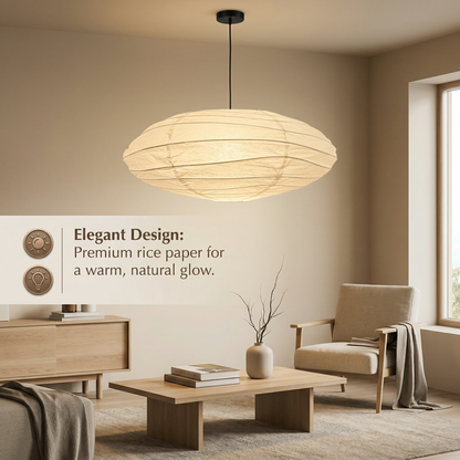 Elegant rice paper pendant lamp hanging in a cozy living room, casting a warm natural glow over a wooden sideboard, coffee table, and fabric armchair.