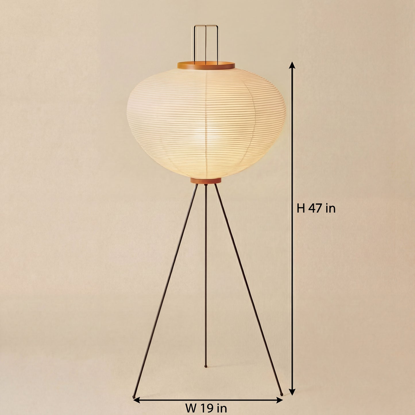 Noguchi-style Japanese tripod floor lamp with a rice paper shade, measuring 47 inches in height and 19 inches in width, casting a soft warm ambient glow in a minimalist interior.