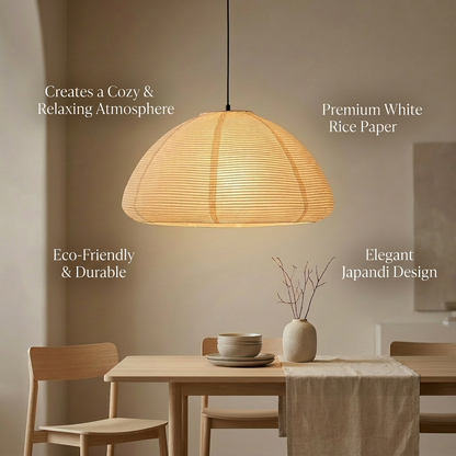 Japanese-Scandinavian fusion design pendant lamp with white rice paper shade providing ambient lighting in cozy home setting.