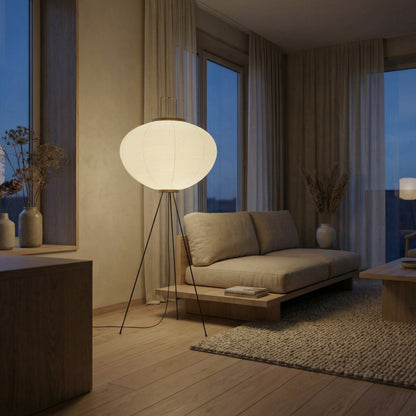 Japanese rice paper tripod floor lamp used as ambient living room lighting