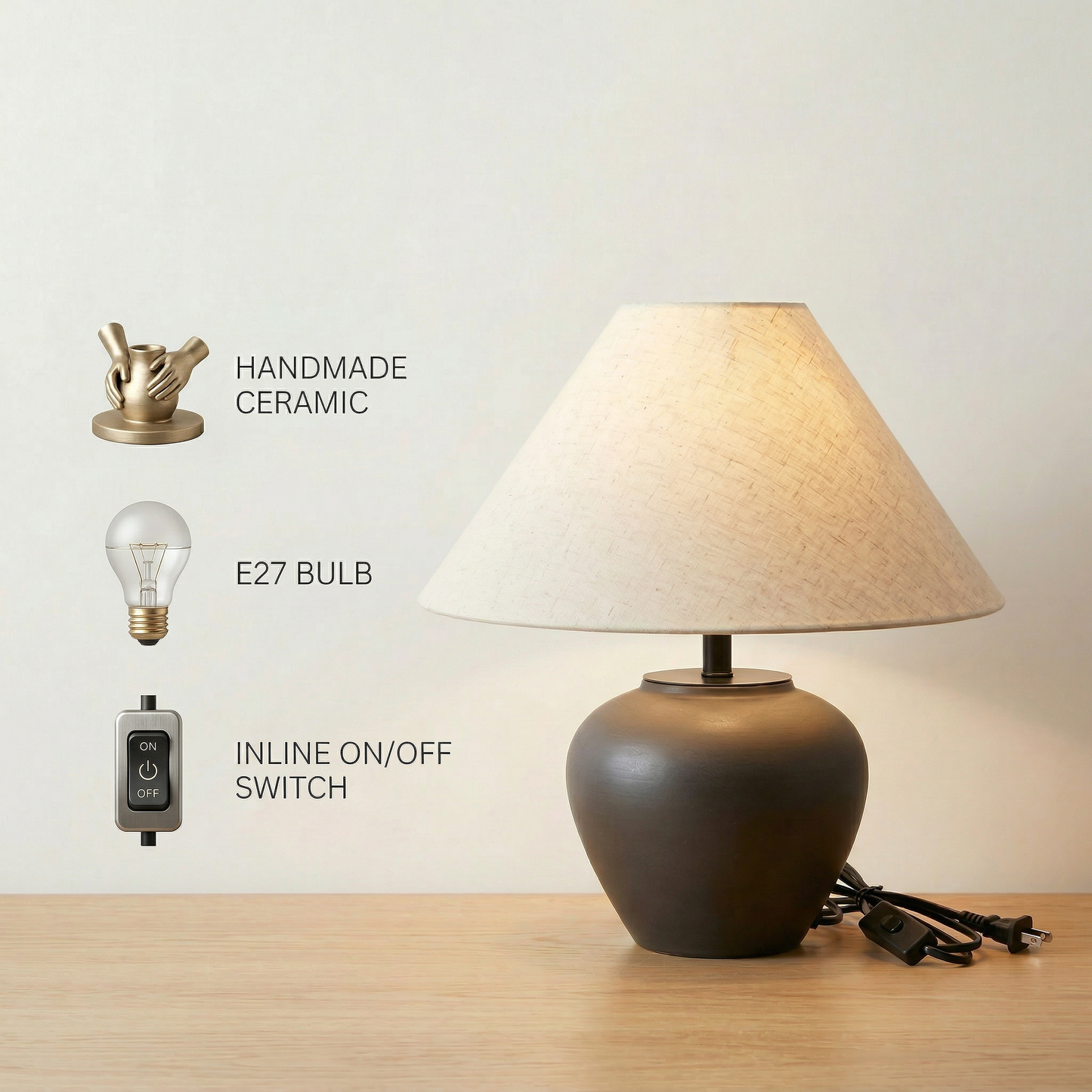 Minimalist handmade ceramic table lamp with rounded charcoal base, linen shade, E27 bulb and inline on/off switch (product features)