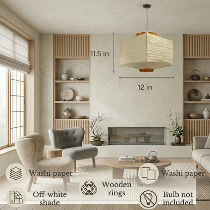 An off-white washi paper pendant light with wooden rings in a minimalist living room, annotated with dimensions of 11.5 inches high by 12 inches wide and noting the bulb is not included.